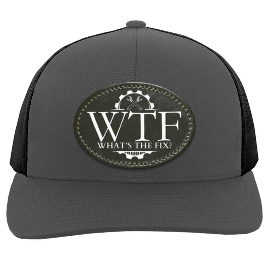 What's The Fix - Oval Patch - 104C Trucker Snap Back - Patch